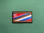 United Russia, DPRK patch, Russia-North Korea solidarity, Russia-Ukraine conflict, North Korean support, St. George’s ribbon, geopolitical patch, militaria, political alignment, Russian flag patch, North Korean flag patch, Russian-North Korean alliance, pro-Russian patch, embroidered patch, Russia special operation Ukraine, historical reproduction patch, iron-on patch, Velcro patch, collector’s item, reenactor gear, political memorabilia, Russian-DPRK cooperation, military insignia, 3.5x2 inch patch, educational display patch, custom backing options.