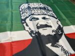 Kadyrov flag, Kadyrovite flag, Akhmat Kadyrov, Chechnya flag, North Caucasus flag, historical flag, collector’s flag, флаг Кадырова, чеченский флаг, bandera de Chechenia, Caucasus resistance, Akhmat Kadyrov portrait flag, flag of Chechnya, Kadyrov militia flag, Kadyrov forces flag, pro-Kadyrov flag, Ramzan Kadyrov, Chechen war memorabilia, Chechen history flag, Grozny flag, replica flag of Chechnya, Akhmad Kadyrov legacy, Islamic green flag, Chechen Republic flag, tricolor flag with portrait, golden pattern flag, Caucasus heritage, Caucasus flag collection, Akhmat Kadyrov replica flag, Kadyrovite tricolor, decorative Chechen flag, polyester Kadyrov flag, Eastern European flag, Caucasus war flag, political memorabilia flag, flag of the Kadyrovites, Kadyrovite faction flag, Chechen collectible flag, military replica flag, Chechen national symbol, ornamental Chechen flag.
