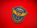 Korean People’s Army Air Force Shield Patch Keywords: North Korea, Korean People’s Army Air Force, KPAAF, 조선인민군, 공군, North Korean military patch, DPRK Air Force, Korean People’s Army patch, socialist military insignia, Mt. Paektu emblem, golden wings, laurel wreath, Cold War aviation, communist military badge, North Korea uniform patch, military memorabilia, replica patch, aviation history, air force insignia, Korean military collector patch, DPRK armed forces, North Korean air defense, Cold War North Korea, socialist air force emblem Korean People’s Army Air Force Winged Star Patch Keywords: North Korea, Korean People’s Army Air Force, KPAAF, DPRK Air Force, North Korean wing patch, red star wings, socialist military insignia, North Korean aviation emblem, winged star badge, Cold War aviation, communist air force patch, DPRK military patch, Korean military aviation, North Korean pilot wings, socialist air force wings, replica patch, North Korea uniform insignia, military memorabilia, aviation history, Cold War North Korea, DPRK armed forces, North Korean flight badge, Korean People’s Army wings, pilot qualification patch