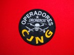 CJNG Operadores Droneros patch, CJNG drone patch, Cartel Jalisco Nueva Generación patch, CJNG patch, Mexico cartel patch, Operadores Droneros insignia, CJNG embroidered patch, Mexican tactical patch, drone warfare insignia, Latin America paramilitary patch, collector patch Mexico, embroidered CJNG badge, cartel reproduction patch, black and yellow tactical patch, historical reproduction insignia, parche CJNG, parche Operadores Droneros, parche Cártel de Jalisco Nueva Generación, parche mexicano, insignia CJNG bordada, emblema del cártel, parche táctico México, insignia paramilitar mexicana, parche coleccionable CJNG, parche réplica histórica