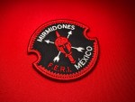 Embroidered Mirmidones F.E.R.I. patch from the Mexican National Guard, featuring a Spartan helmet with crossed weapons and circular red-and-black design.