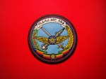 Round 3.75-inch embroidered Ethiopian Air Force emblem patch featuring aviation wings, crossed weapons, Ethiopian star, national tricolor, wreath elements, and Amharic banner on a light blue field.