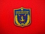 Vietnam Coast Guard embroidered patch featuring a blue shield, red satin border, yellow Cảnh Sát Biển Việt Nam and Vietnam Coast Guard text, and central maritime anchor crest with laurel branches.