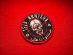 3.5 inch ISIS Hunters patch with skull in red crosshair, black background, red border, English ISIS Hunters text and Arabic صائدو داعش insignia associated with Russian Wagner-linked Syrian unit