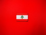 Embroidered State of Free Lebanon historical flag patch featuring a red and white Lebanese flag with a green cedar tree, brown trunk and branches, available with either a white or red satin border.