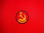 Three-inch round MLKP Marxist-Leninist Communist Party reproduction patch featuring a yellow hammer, sickle, star, and lettering on a red background with a black border.