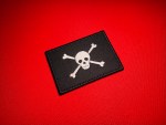Biafran 4th Commando Brigade embroidered reproduction patch featuring a white skull and crossbones on a black field.