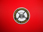 Los Chapitos Mata Flechas embroidered reproduction patch featuring Fuerzas Especiales Casco lettering, an 80-81 skull, crossed rifles, and a white border on red fabric.