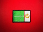 Front view of the 3.5 × 2.33-inch MILF Moro Islamic Liberation Front reproduction shoulder patch from the Philippines, showing green and white panels, a white sword, gold crescent and five-pointed star, and black edging.